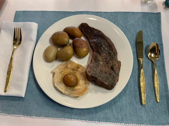 Steak and eggs with roasted potatoes.