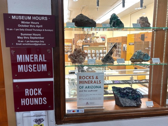 Case of minerals and signage.