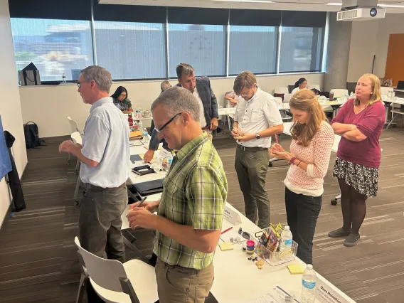 Attendees complete an exercise during one of our planning meetings.